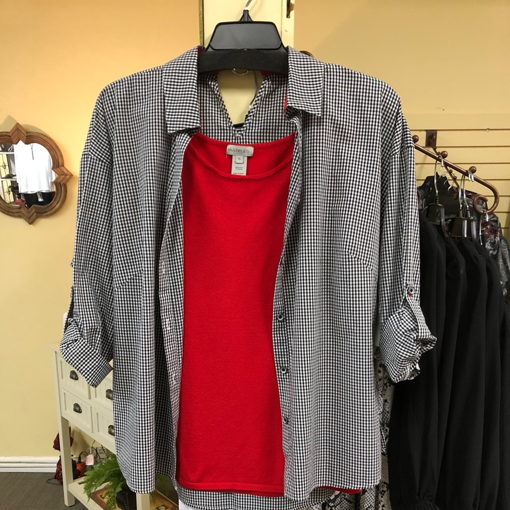 Houndstooth print button up blouse.